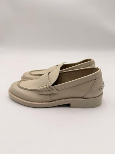 Women’s Chanel Shiny Calfskin Logo Loafers in beige Size 35