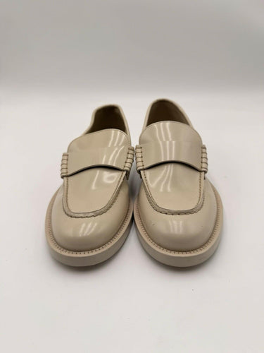 Women’s Chanel Shiny Calfskin Logo Loafers in beige Size 35