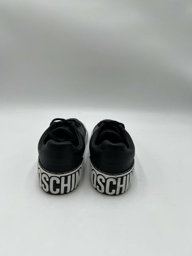 Women’s Moschino Low Top  logo-embossed leather sneakers Size 39