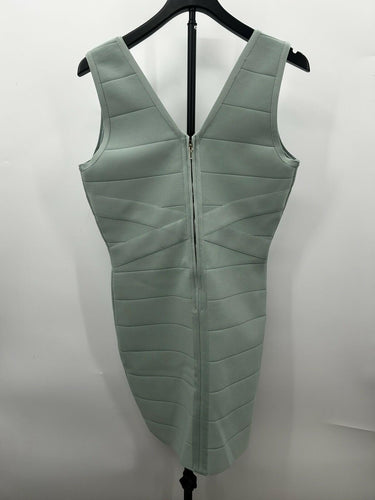 Bebe Woman’s mint green V-neck bandage mini dress Crisscross Waist Size L
