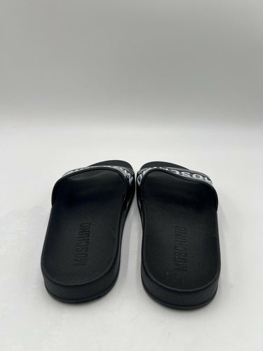 Women’s Moschino black PVC logo pool slides Size 35